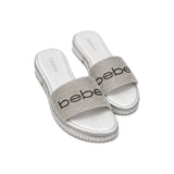 Bebe Rhinestone Logo Slide Sandals In White/Silver