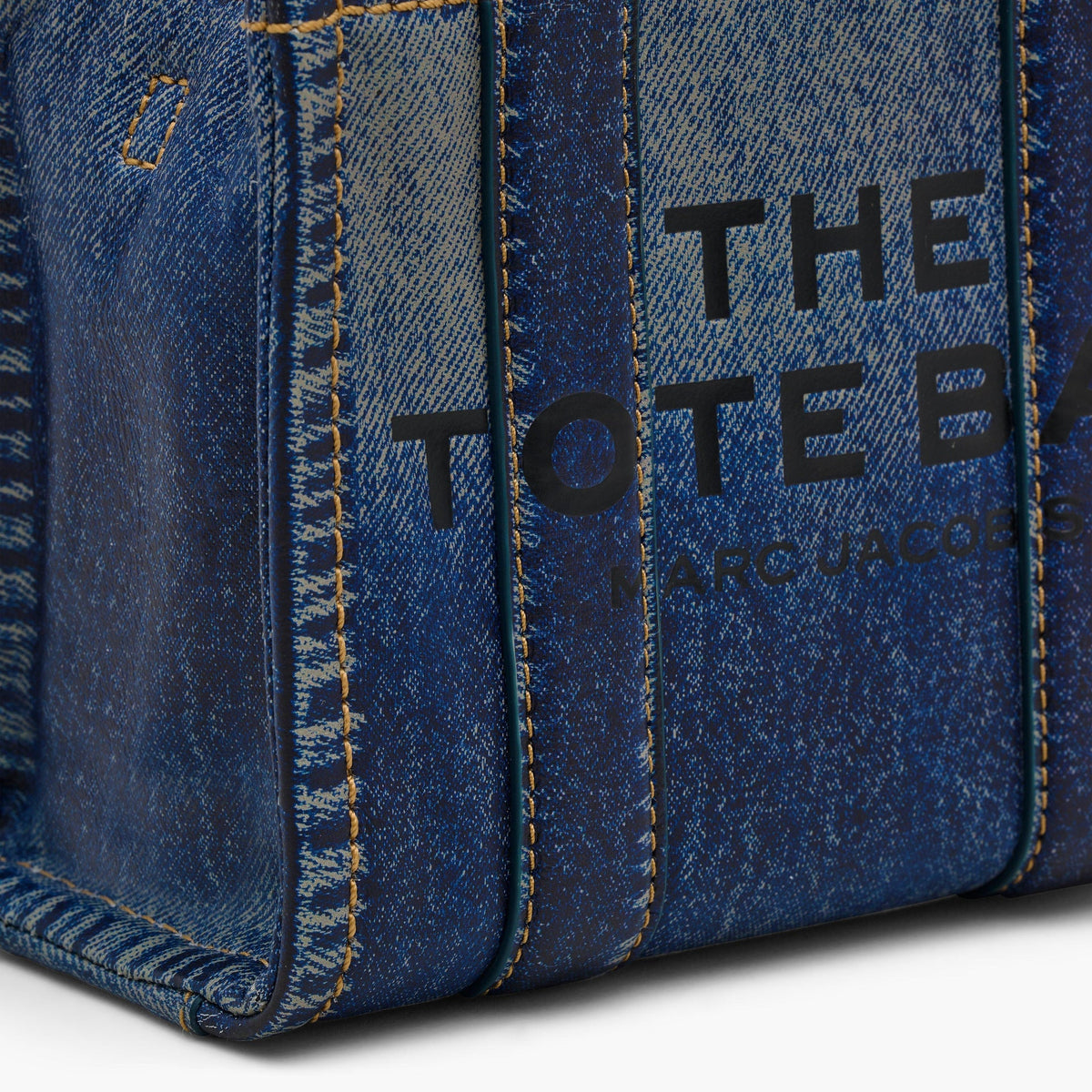 Marc Jacobs
THE DENIM-PRINTED LEATHER MICRO TOTE BAG