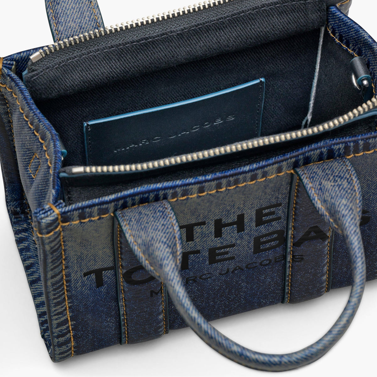 Marc Jacobs
THE DENIM-PRINTED LEATHER MICRO TOTE BAG